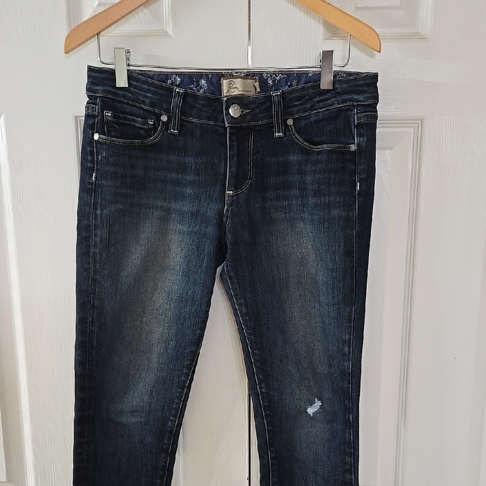 Blue Skinny Jeans with Distressed Details